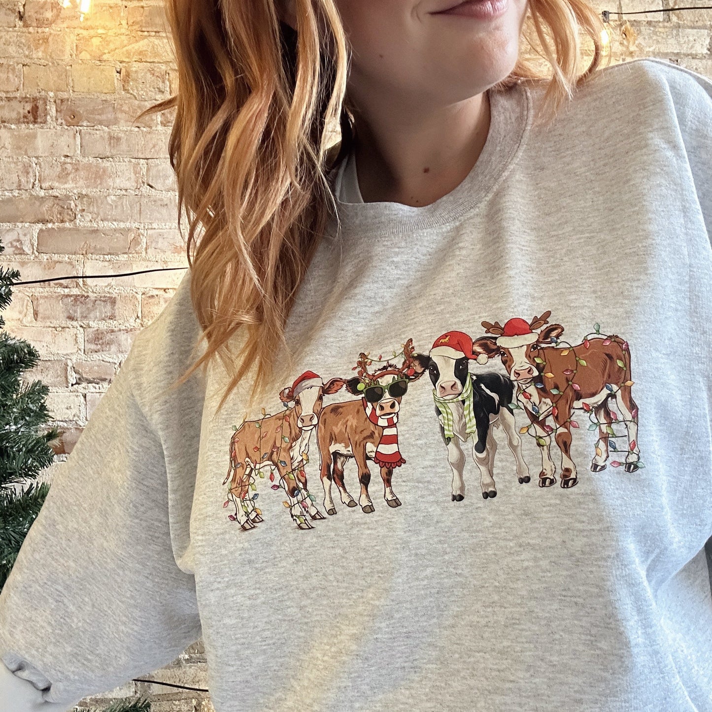 FESTIVE COW CREWNECK