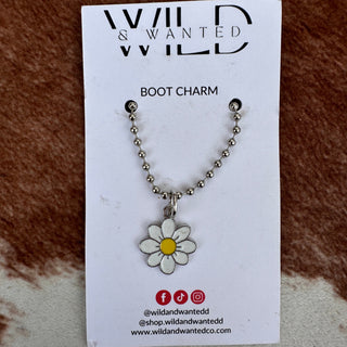 Flower boot charm on a card with 'Wild & Swanted' branding.